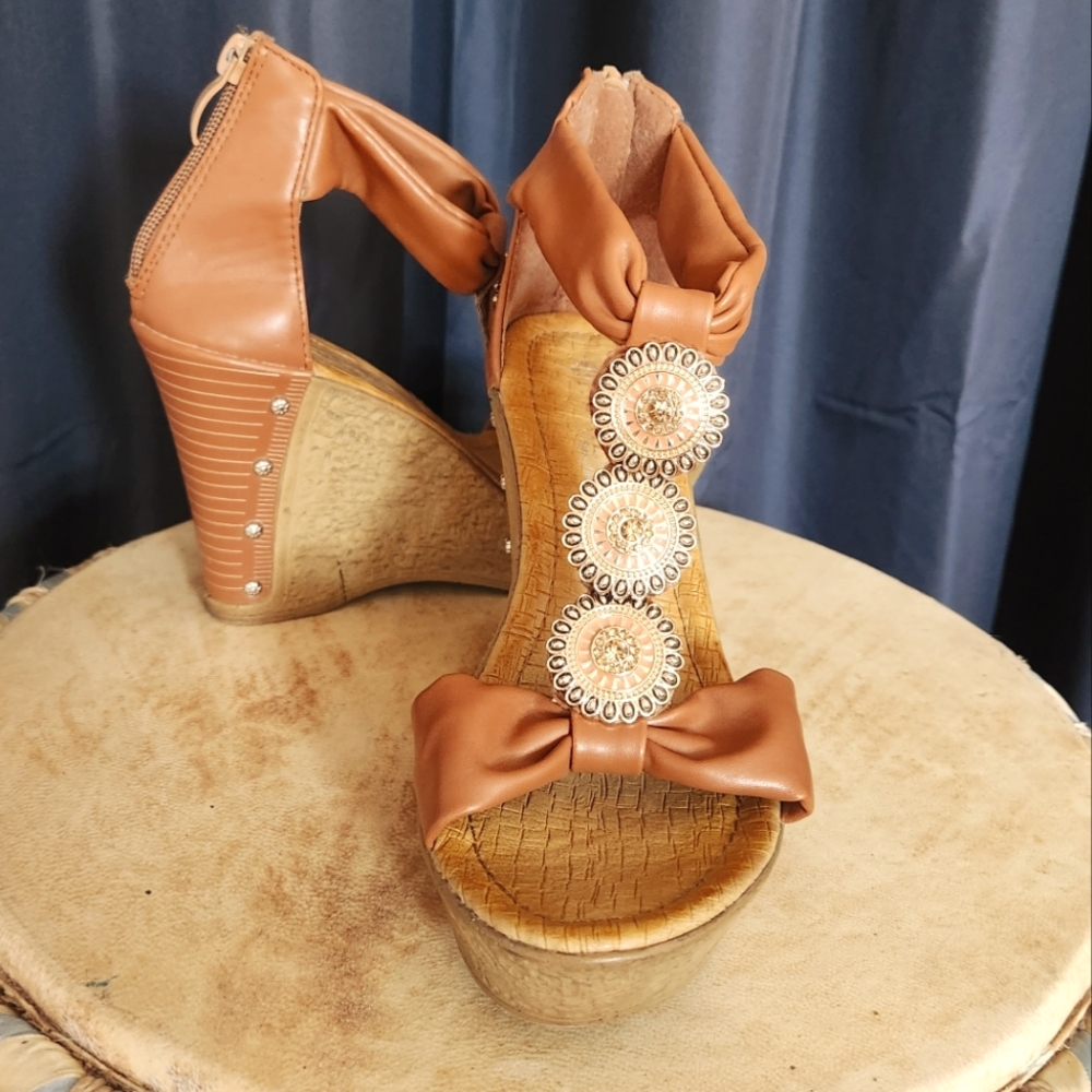 Gorgeous high wedge sandals with plenty of bling